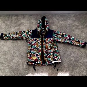 Saga Outerwear snowboard jacket. Medium size. Colorful camouflage design.